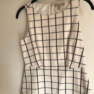 Beautiful black and white peplum banana repub top